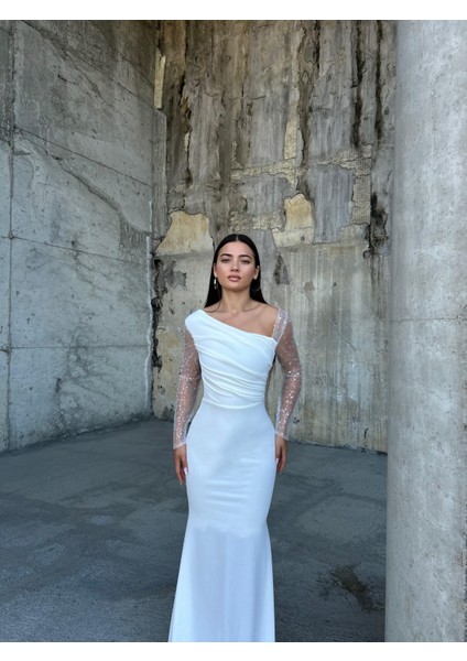 Kadın Esnek Krep Kumaş Kolları Tül ve Taş Detaylı Önü Drapeli Maxi Boy Balık Abiye Elbise Beyaz 583118 fiyatları