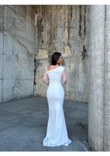Kadın Esnek Krep Kumaş Kolları Tül ve Taş Detaylı Önü Drapeli Maxi Boy Balık Abiye Elbise Beyaz 583118 modelleri