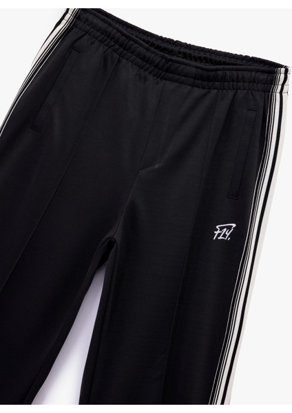 Viskon Karışımlı Beli Lastikli Cepli Şerit Detaylı Baskılı Bol Kalıp Eşofman Altı modelleri