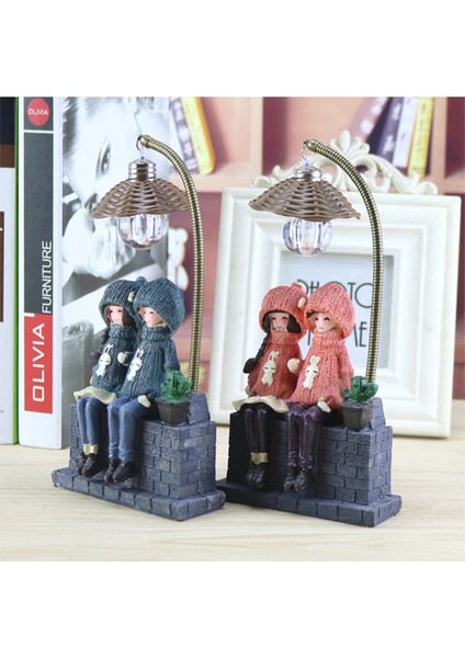 Oturan Şapkalı Çift Işıklı Biblo