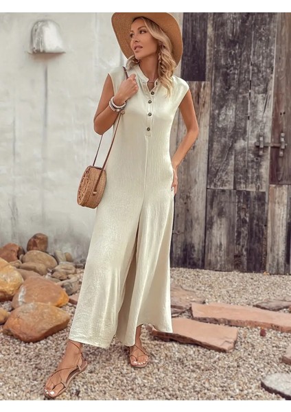 Kadın Kısa Kollu Önden Düğmeli Paçaya Doğru Geniş Cepli Uzun Bürümcük Tulum indirimleri