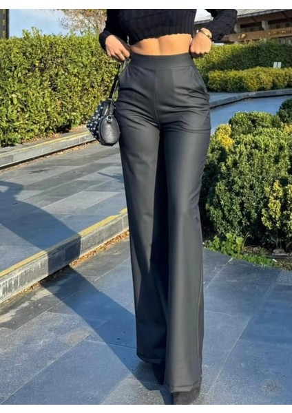 Kadın Yüksek Bel Cepli Şardonlu Geniş Paçalı Mat Deri Pantolon
