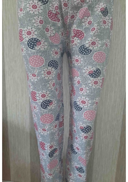 Pembe Uzun Kollu Desenli Üst ve Desenli Uzun Alt Kadın Pijama Takımı fiyatları