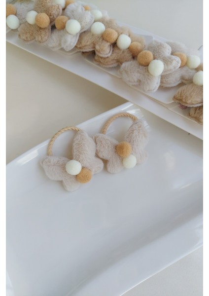 Kelebek Model Ponpon Detaylı Peluş Lastik Toka Seti 2 Adet fırsatları