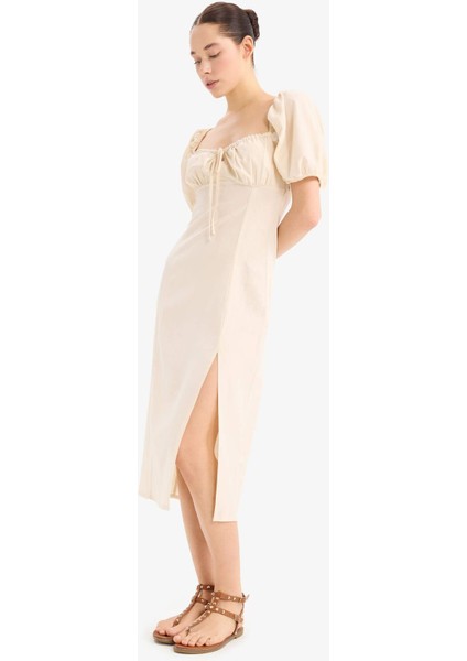 Kalp Yaka Yırtmaçlı Keten Karışımlı Kısa Kollu Midi Elbise C0941AX25SM fiyatları