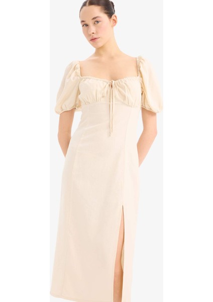 Kalp Yaka Yırtmaçlı Keten Karışımlı Kısa Kollu Midi Elbise C0941AX25SM fırsatları