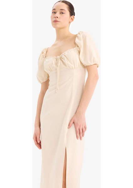 Kalp Yaka Yırtmaçlı Keten Karışımlı Kısa Kollu Midi Elbise C0941AX25SM indirimleri