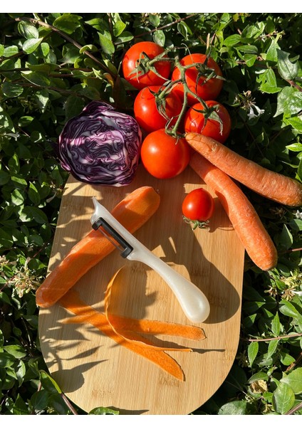 Pırıltılı Beyaz Dik Soyacak – Paslanmaz Alman Çeliği, Ergonomik Sap, Yüksek Keskinlik fırsatları