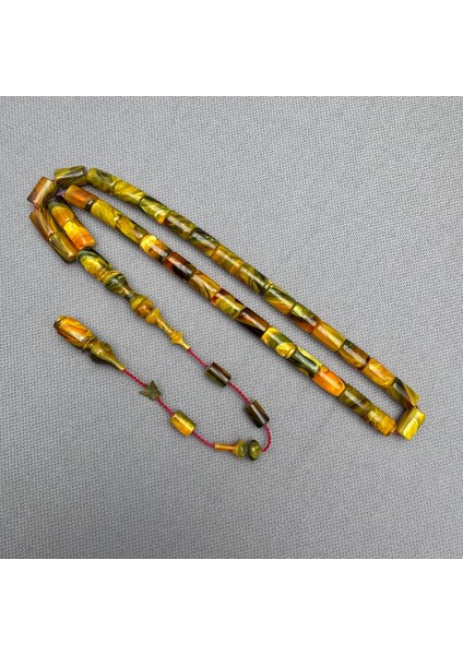 Emine Reşvani Usta Işçilikli Kesme Model Yoğun Hareli Yeşil Turuncu Sıkma Kehribar Tespih modelleri