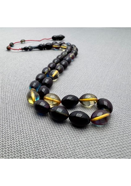 Şeffaf Hareli Usta Işçilikli 8X11MM Sıkma Kehribar Tespih