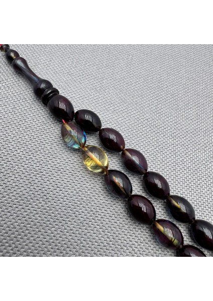 Şeffaf Hareli Usta Işçilikli 8X11MM Sıkma Kehribar Tespih fiyatları