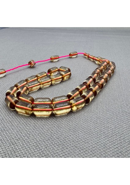 Erkan Çubukçu Usta Işçilikli Şeffaf Sıkma Kehribar Tespih