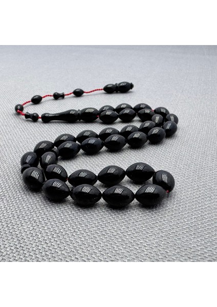 Usta Işçilikli 6.5X10MM Siyah Sıkma Kehribar Tespih