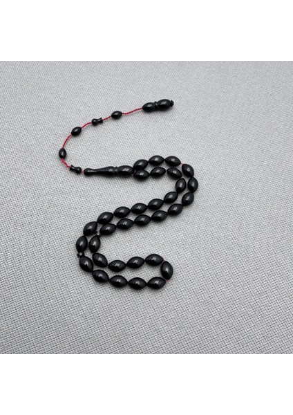 Usta Işçilikli 6.5X10MM Siyah Sıkma Kehribar Tespih fiyatları