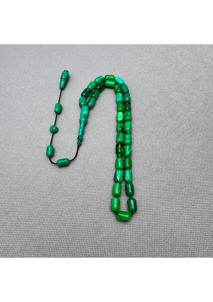 Erkan Çubukçu Usta Işçilikli Yeşil Hareli Sıkma Kehribar Tespiih modelleri