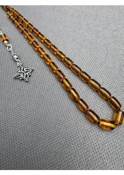 925 Ayar Gümüş Püsküllü Bilek Boy Bal Rengi Sıkma Kehribar Tespih fiyatları