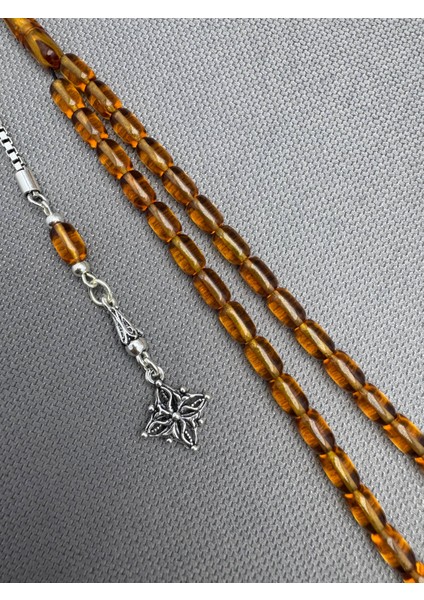 925 Ayar Gümüş Püsküllü Bilek Boy Bal Rengi Sıkma Kehribar Tespih modelleri