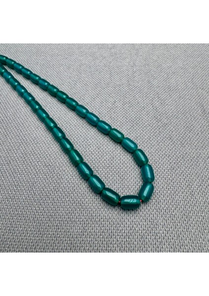 925 Ayar Gümüş Püsküllü Bilek Boy Zümrüt Yeşili Sıkma Kehribar Tespih fırsatları