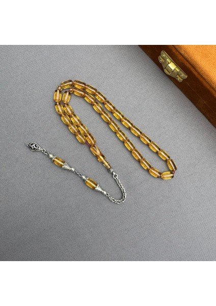 Alpaka Püsküllü Açık Şeffaf Turuncu Kapsül Kesim Sıkma Kehribar Tespih modelleri