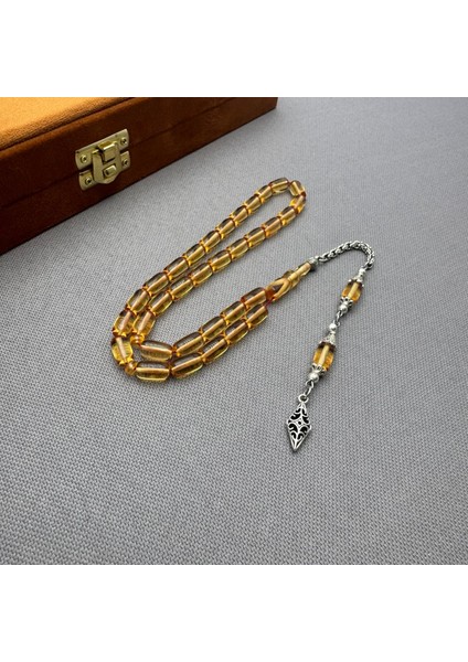 Alpaka Püsküllü Açık Şeffaf Turuncu Kapsül Kesim Sıkma Kehribar Tespih fırsatları