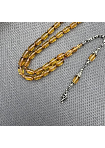 Alpaka Püsküllü Açık Şeffaf Turuncu Kapsül Kesim Sıkma Kehribar Tespih indirimleri