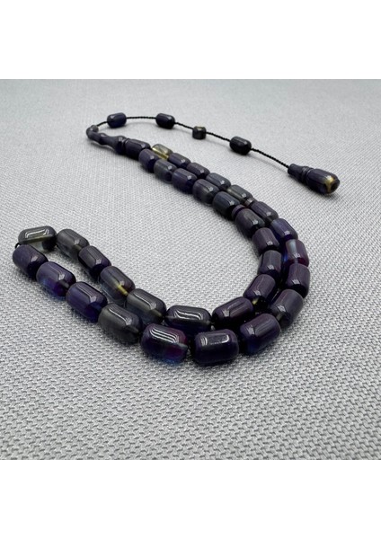 Erkan Çubukçu Usta Işçilikli Şeffaf Mavi Hareli Sıkma Kehribar Tespih