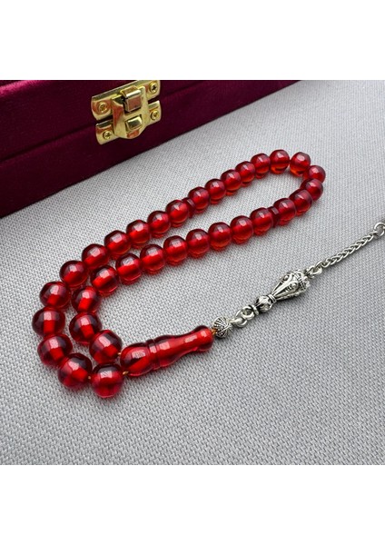 Alpaka Püsküllü Havşa Delim Küre Kesim Kırmızı Renk Sıkma Kehribar Tespih modelleri