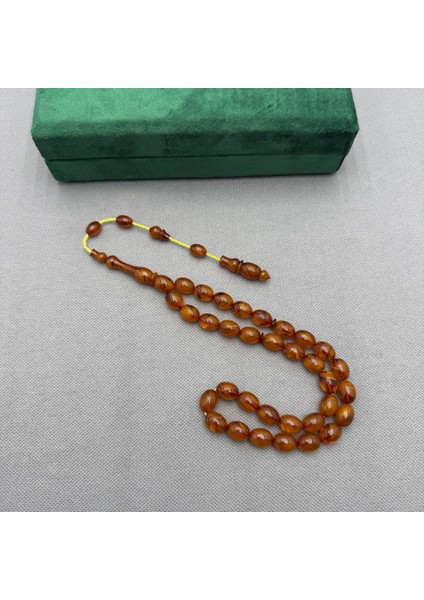 Bülbül Atölye Yoğun Hareli Damarlı Sıkma Kehribar Tespih fiyatları