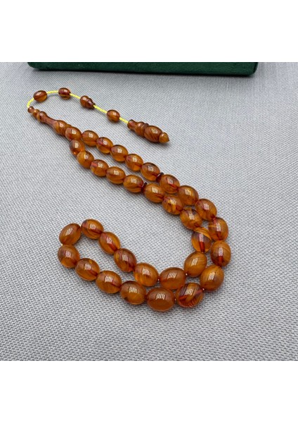 Bülbül Atölye Yoğun Hareli Damarlı Sıkma Kehribar Tespih modelleri