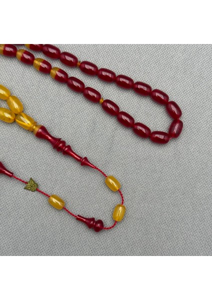 Emine Reşvani Usta Işçilikli Sarı Kırmızı Renk Geçişli Hareli Sıkma Kehribar Tespih fırsatları