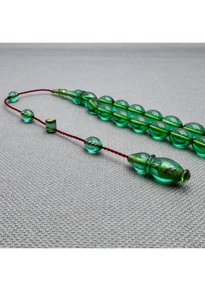 Erkan Çubukçu Usta Işçilikli Zümrüt Yeşili Sıkma Kehribar Tespih fırsatları