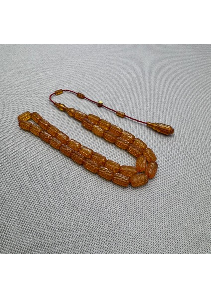 Ahmet Sarı Usta Kalem Işçilikli Kapsül Kesim Sıkma Kehribar Tespih modelleri