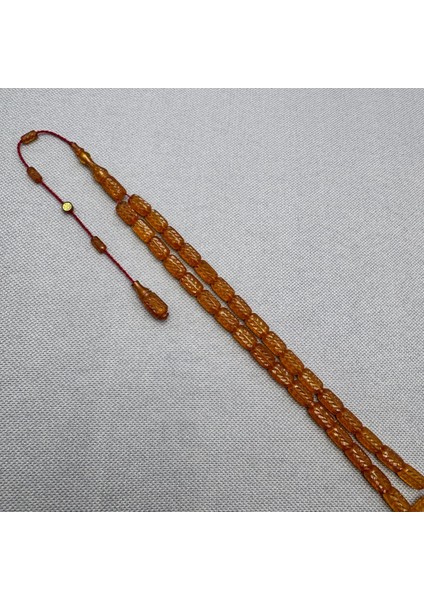 Ahmet Sarı Usta Kalem Işçilikli Kapsül Kesim Sıkma Kehribar Tespih indirimleri