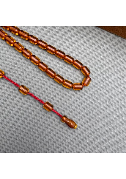 Turuncu Kapsül Kesim Sistemli Püskül Sıkma Kehribar Tespih fiyatları