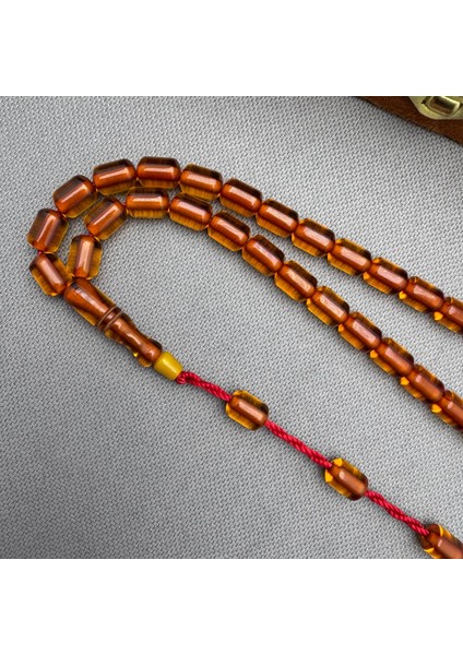 Turuncu Kapsül Kesim Sistemli Püskül Sıkma Kehribar Tespih modelleri