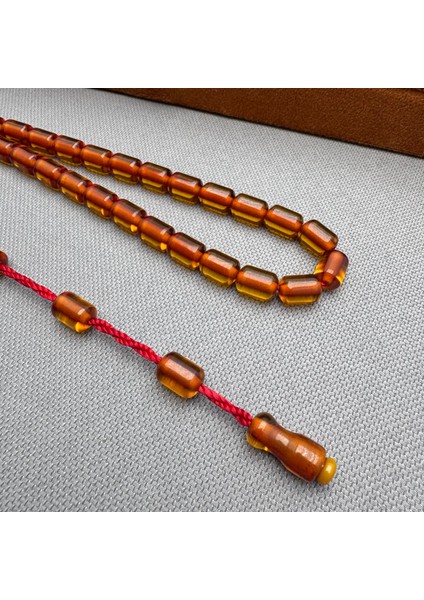 Turuncu Kapsül Kesim Sistemli Püskül Sıkma Kehribar Tespih fırsatları