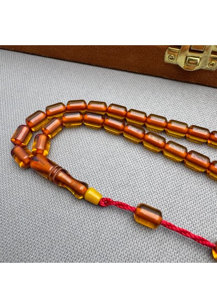 Turuncu Kapsül Kesim Sistemli Püskül Sıkma Kehribar Tespih indirimleri