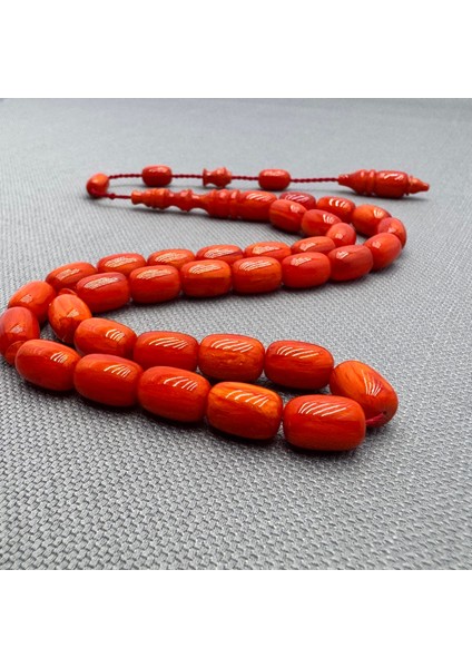 Usta Işçilikli Mercan Rengi Sıkma Kehribar Tespih modelleri