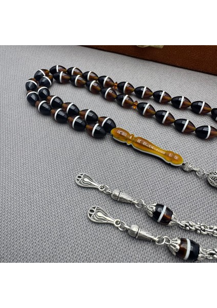 Alpaka Püsküllü Özel Işçilkikli Kahverengi Siyah Sürmeli Sıkma Kehribar Tespih modelleri