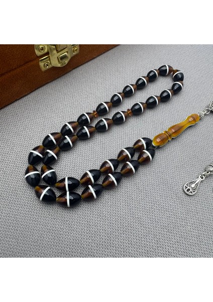 Alpaka Püsküllü Özel Işçilkikli Kahverengi Siyah Sürmeli Sıkma Kehribar Tespih fırsatları