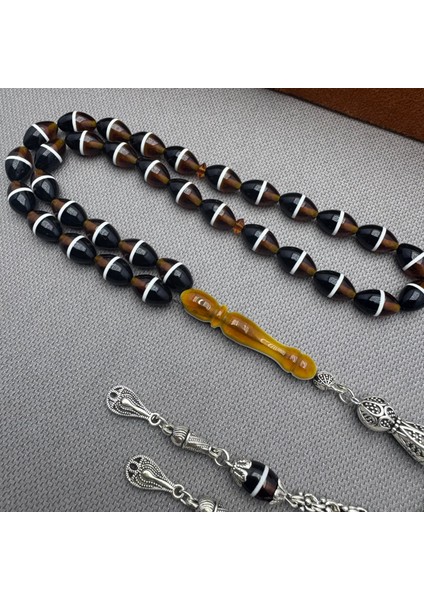 Alpaka Püsküllü Özel Işçilkikli Kahverengi Siyah Sürmeli Sıkma Kehribar Tespih indirimleri