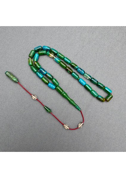 Usta Işçilikli Yeşil ve Turkuaz Renk Yogun Hare Desenli Sıkma Kehribar Tespih fiyatları