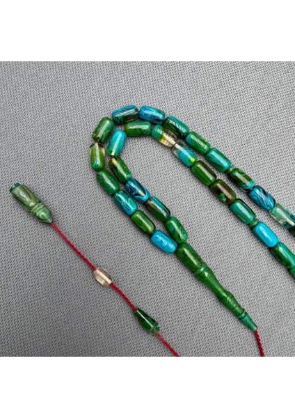 Usta Işçilikli Yeşil ve Turkuaz Renk Yogun Hare Desenli Sıkma Kehribar Tespih modelleri