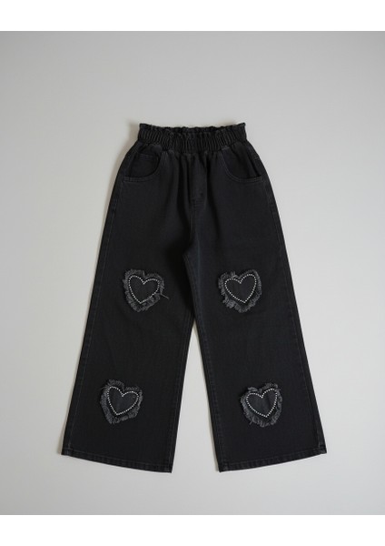 Kalp Nakışlı ve Püskül Detaylı Beyaz Sweatshirt Siyah Palazzo Jean Kız Çocuk Takımı indirimleri