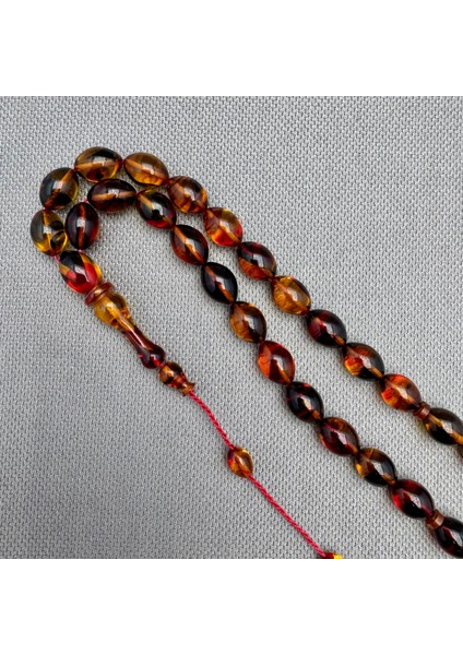 Usta Işçilikli Sarı Kırmızı Renk Geçili Hareli Sıkma Kehribar Tespih indirimleri