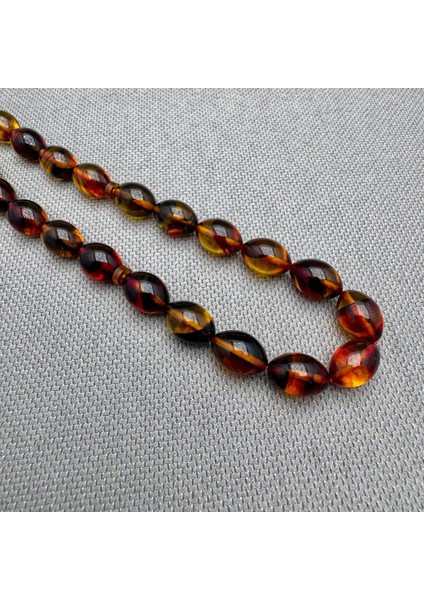 Usta Işçilikli Sarı Kırmızı Renk Geçili Hareli Sıkma Kehribar Tespih