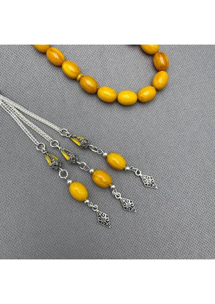 Özel Alpaka Dizayn Püsküllü Sarı Renk Dikey Yoğun Hareli Sıkma Kehribar Tespih fiyatları