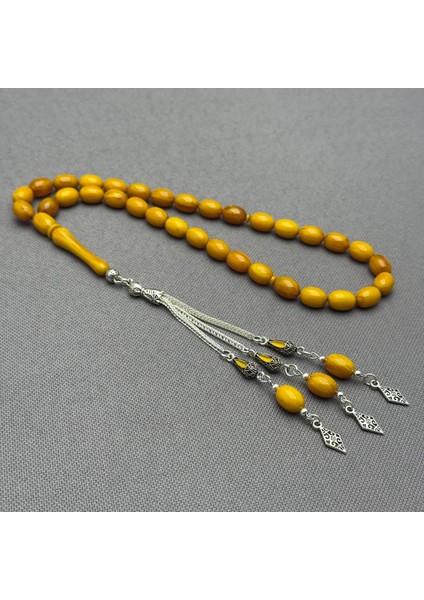 Özel Alpaka Dizayn Püsküllü Sarı Renk Dikey Yoğun Hareli Sıkma Kehribar Tespih indirimleri