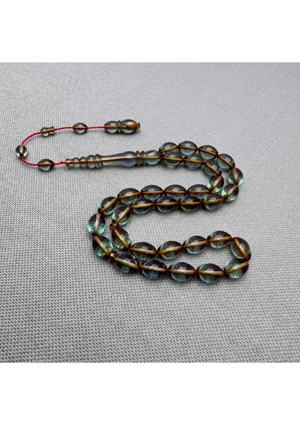 Usta Işçilikli Mavi Sıkma Kehribar Tespih modelleri