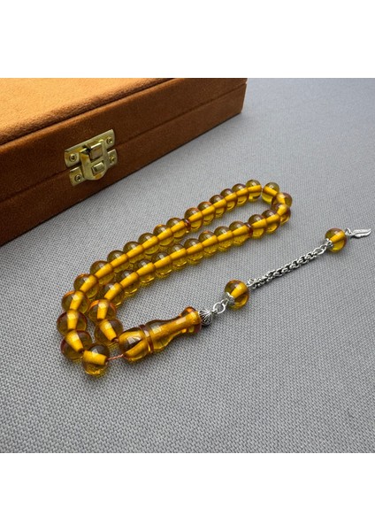 Alpaka Püsküllü Sarı Bilek Boy Sıkma Kehribar Tespih fiyatları